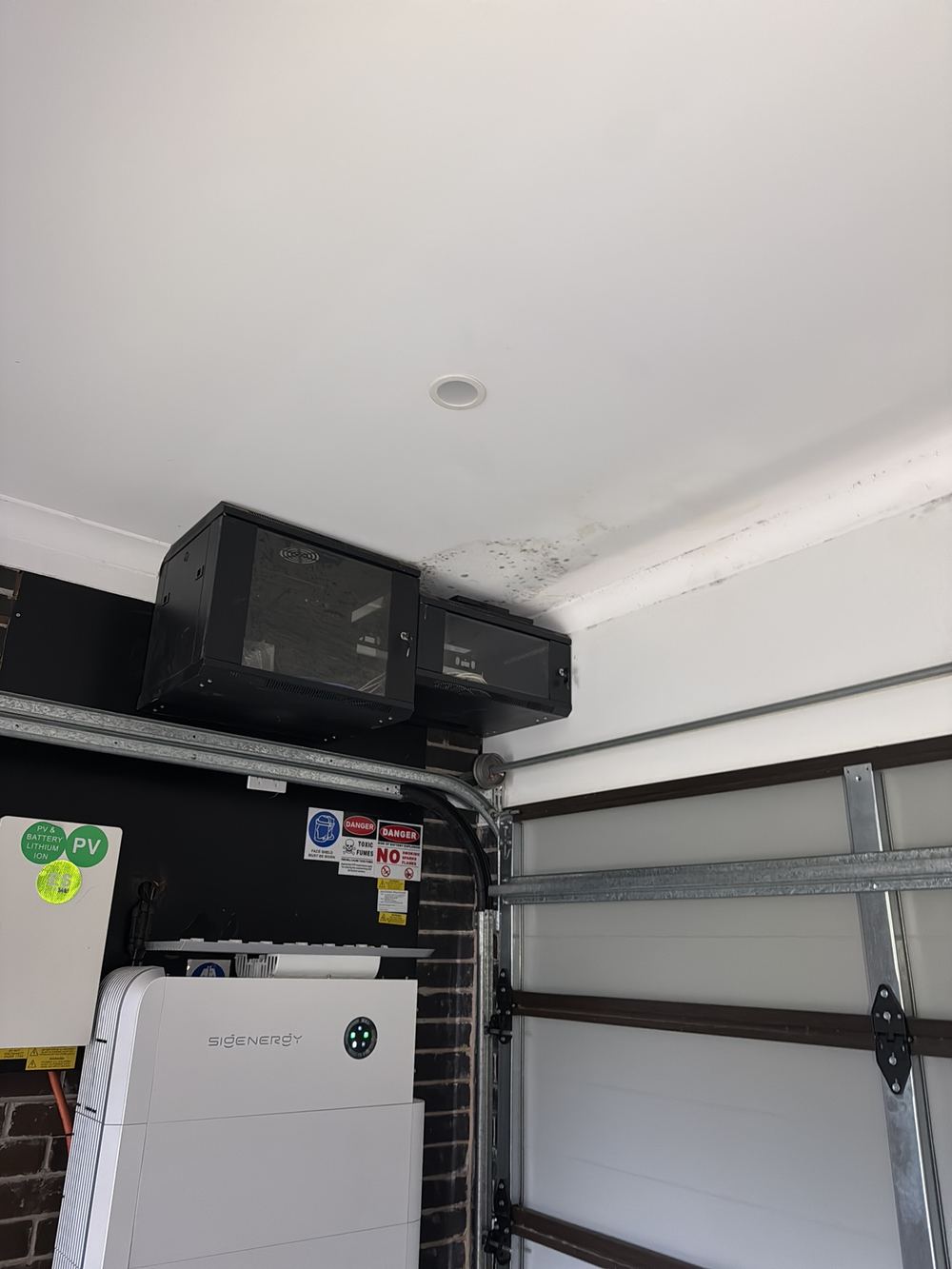 Mould along the garage ceiling, a sign of moisture that has lasted, found during a defect investigation in Berwick